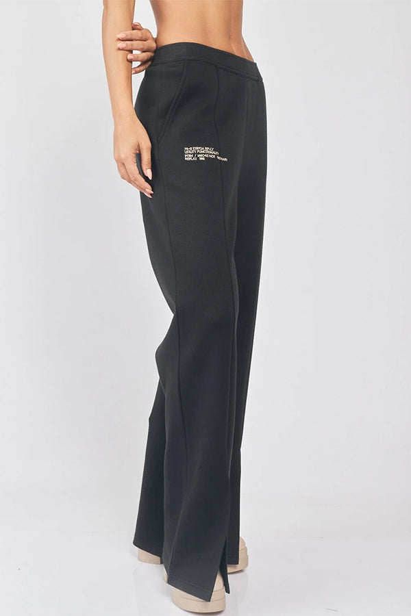 מכנסיים מתרחבים עם שסע נשים