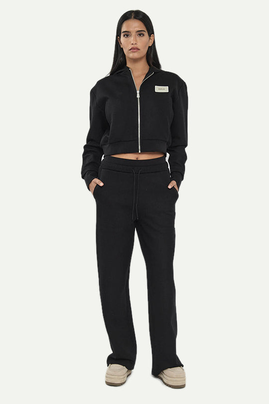 מכנסי טרנינג W INTERLOCK בצבע שחור