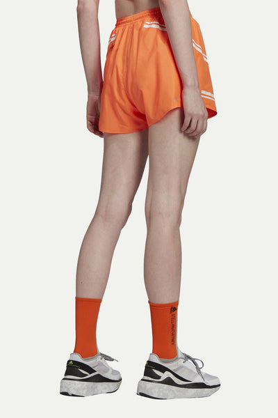 מכנסי טפא קצרים בצבע כתום וקווים אמורפיים - Adidas Stella