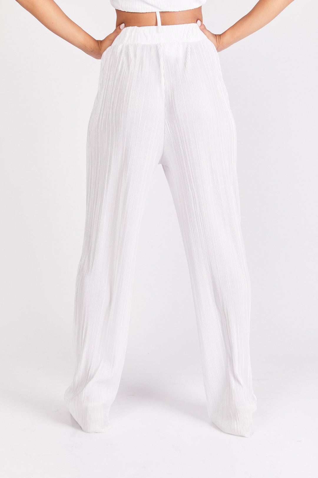 מכנסי קואצ'לה בצבע לבן לורקס - Neta Efrati