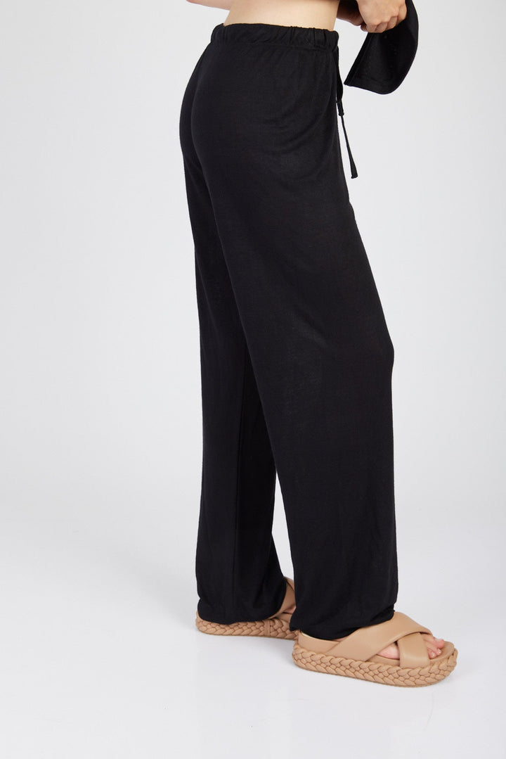 מכנסי טרנינג אמה בצבע שחור - Moi Collection