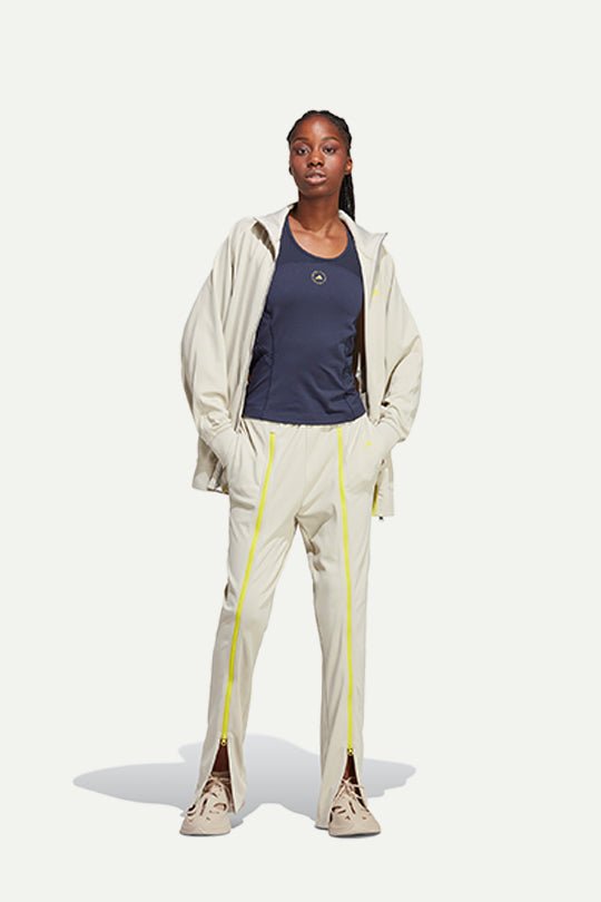 מכנסיים מתרחבים Asmc TR PNT בצבע בז' - Adidas Stella