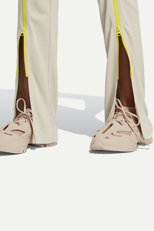 מכנסיים מתרחבים Asmc TR PNT בצבע בז' - Adidas Stella