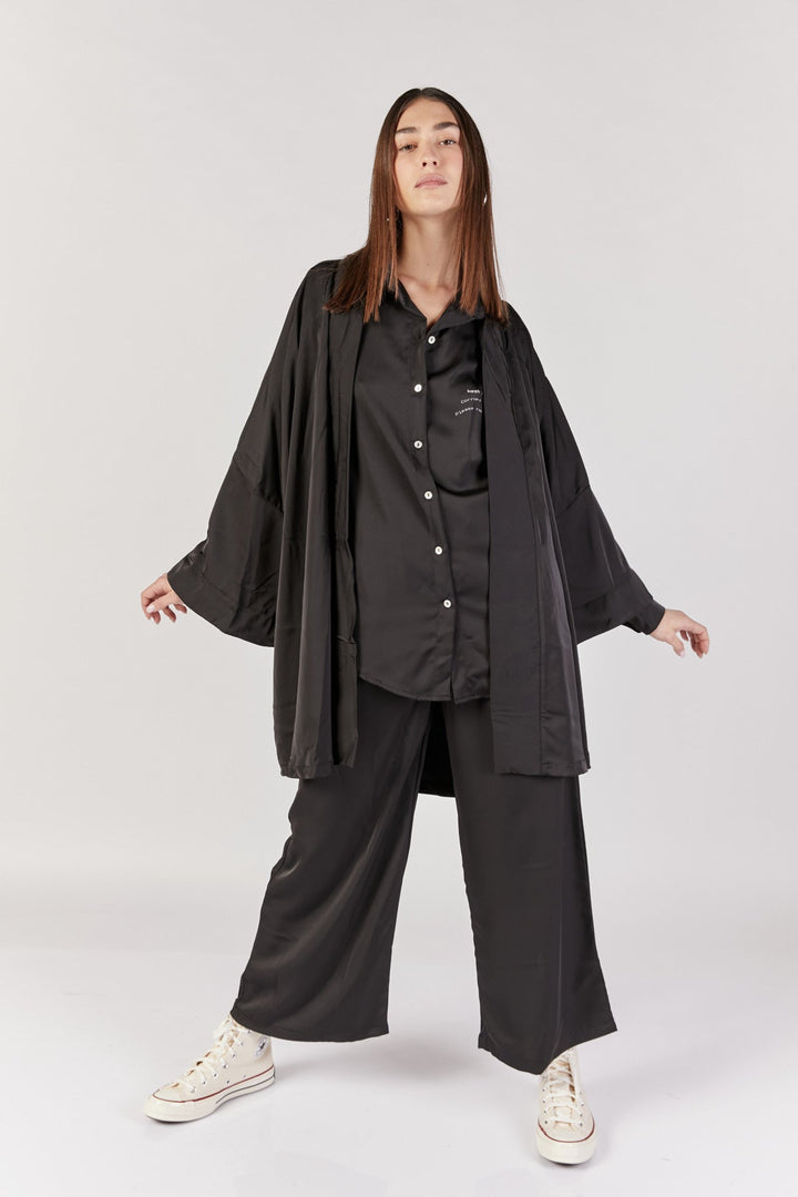 מכנסיים רחבים דיסקונקטד בצבע שחור - Kesh Limited