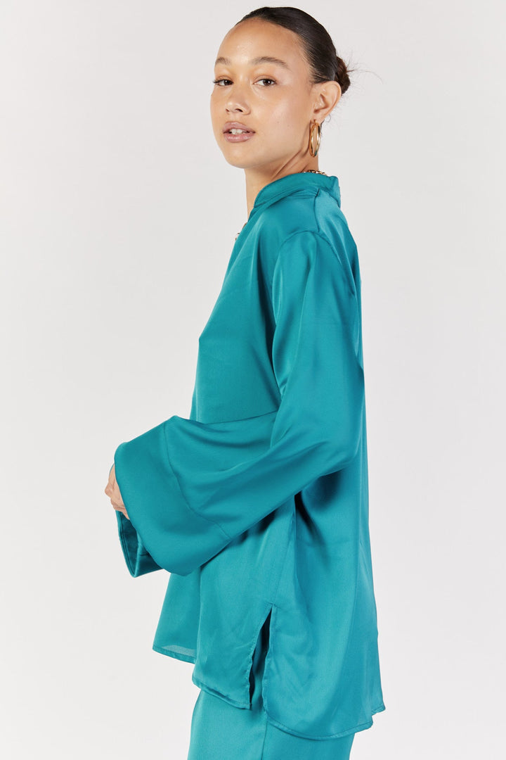 חולצה מכופתרת זוהרה בצבע טורקיז - Dana Sidi